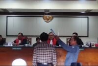 Foto: Ahmadi Zubir saat di ruang persidangan PN Sungai Penuh