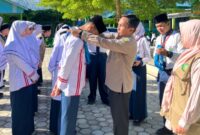 Kepala MTsN 1 Kota Sungai Penuh Resmi Lantik Anggota PMR Madya