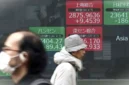 Bursa saham Asia Pasifik melonjak pada perdagangan Selasa, (24/3/2026). (AP Photo/Eugene Hoshiko)