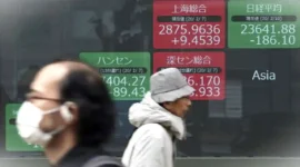 Bursa saham Asia Pasifik melonjak pada perdagangan Selasa, (24/3/2026). (AP Photo/Eugene Hoshiko)