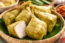 Ilustrasi ketupat. Resep Ketupat Simpel Masak Cuma 40 Menit, Hemat Gas dan Tetap Pulen.(Ilustrasi dibuat AI)