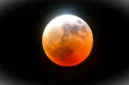 Ilustrasi blood moon. (AI Generated Image)