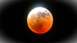 Ilustrasi blood moon. (AI Generated Image)