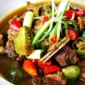 Ilustrasi asem-asem daging. (Shutterstock)