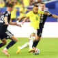 Neymar dikawal ketat Kenny McLean, dan Lewis Ferguson, dalam pertandingan Grup C Piala Dunia 2026 antara Skotlandia dan Brasil di Stadion Miami, Miami Gardens, pada 24 Juni 2026.(AFP/PATRICIA DE MELO MOREIRA)