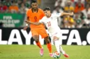 Cody Gakpo, dan Brahim Diaz, berebut bola dalam pertandingan sepak bola babak 32 besar Piala Dunia 2026 antara Belanda dan Maroko di Stadion Monterrey, Guadalupe, pada 29 Juni 2026.(AFP/ALFREDO ESTRELLA)