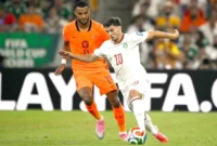 Cody Gakpo, dan Brahim Diaz, berebut bola dalam pertandingan sepak bola babak 32 besar Piala Dunia 2026 antara Belanda dan Maroko di Stadion Monterrey, Guadalupe, pada 29 Juni 2026.(AFP/ALFREDO ESTRELLA)