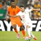 Cody Gakpo, dan Brahim Diaz, berebut bola dalam pertandingan sepak bola babak 32 besar Piala Dunia 2026 antara Belanda dan Maroko di Stadion Monterrey, Guadalupe, pada 29 Juni 2026.(AFP/ALFREDO ESTRELLA)