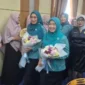 Ketua TP PKK Provinsi Jambi, Hj. Hesnidar Haris, S.E., dan Ketua TP PKK Kota Sungai Penuh, Sri Kartini Alfin, S.Kep., Ns., pada kegiatan Gerakan Jambi Bersholawat.