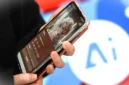 Ilustrasi. Akun TikTok @nia.hajar_s jadi viral setelah terungkap sebagai hasil AI. (Foto: AFP/JADE GAO)