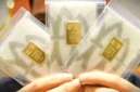 Ilustrasi emas Antam. Harga emas Antam hari ini. Harga emas Antam. Harga emas hari ini. Harga emas Antam terbaru. Harga 1 gram Antam. (kompas.com)