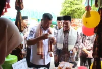 Bupati Kerinci Monadi, bersama Kakankemenag Kerinci Pahrizal saat Kegiatan Harlah ke-89, Pensi dan Expo IX MTsN 6 Kerinci.