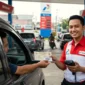 Ilustrasi - Pengendara Wajib Tunjukkan STNK Saat Beli Biosolar. (Foto: AI)
